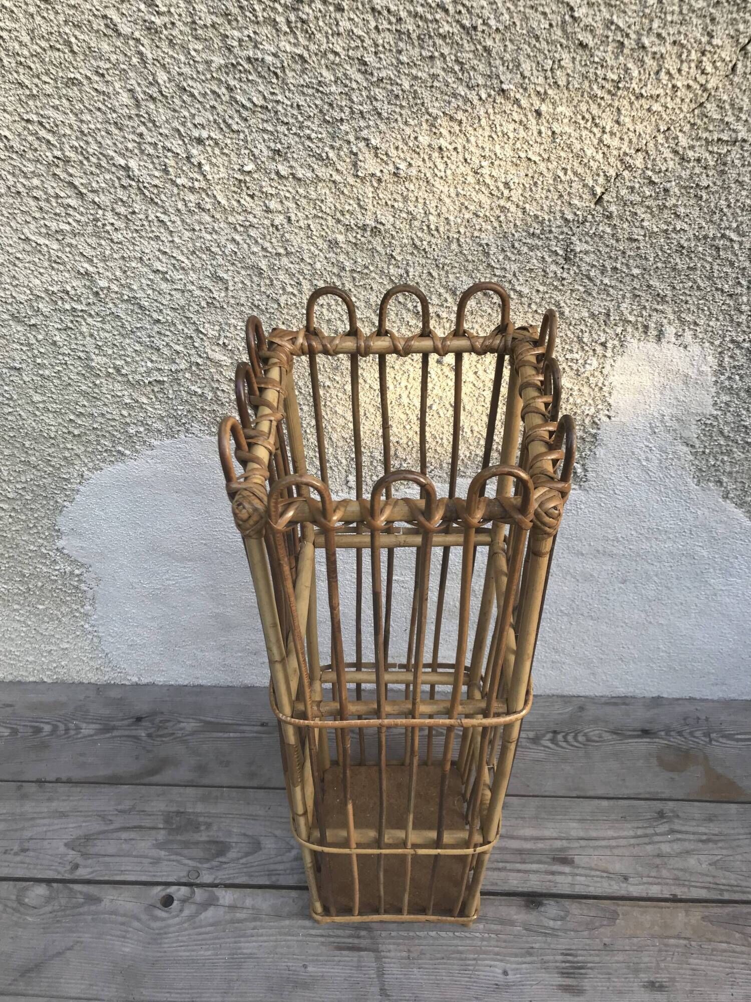 Old woven rattan umbrella holder from the 60's