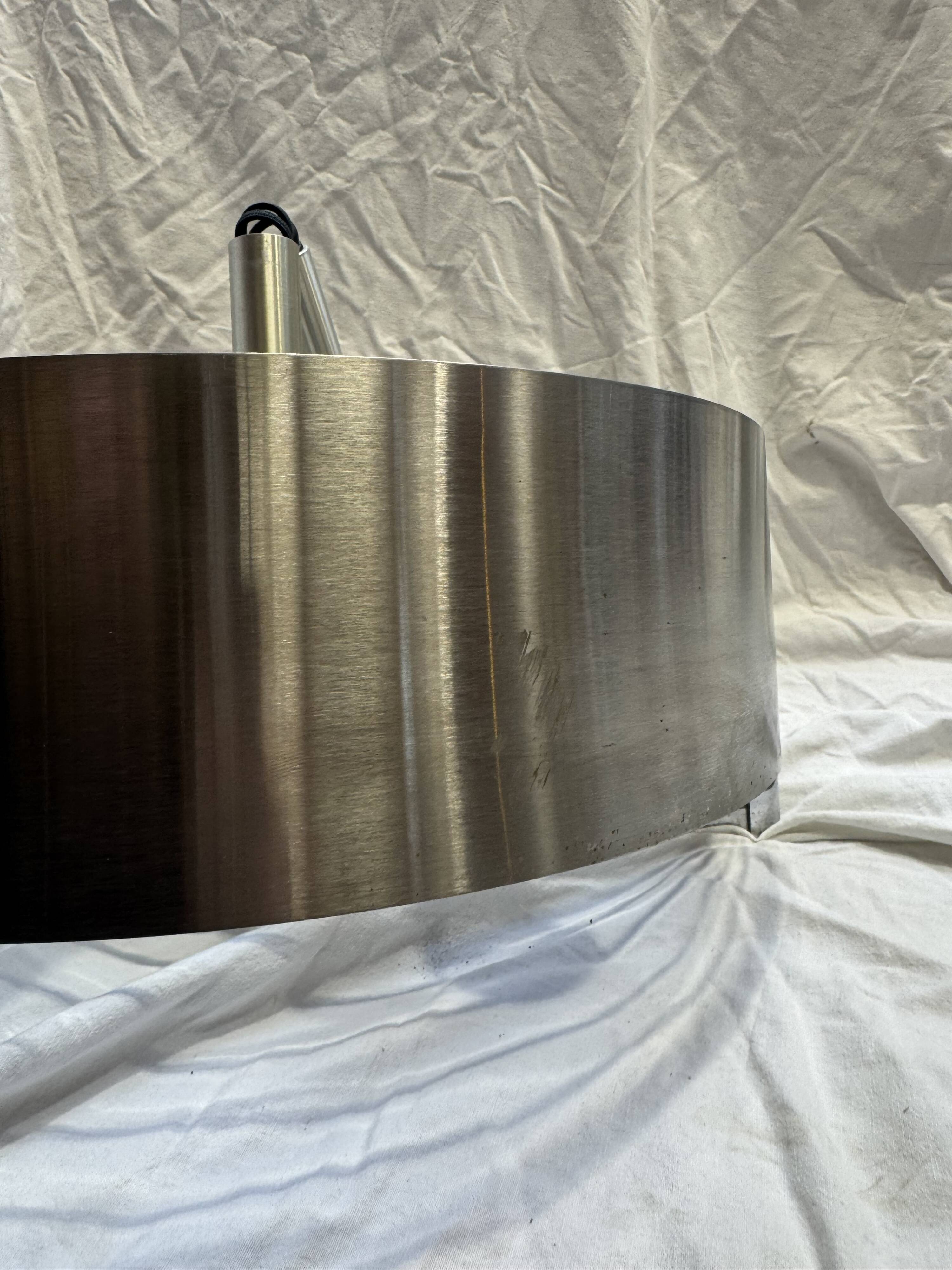 Brushed steel suspension