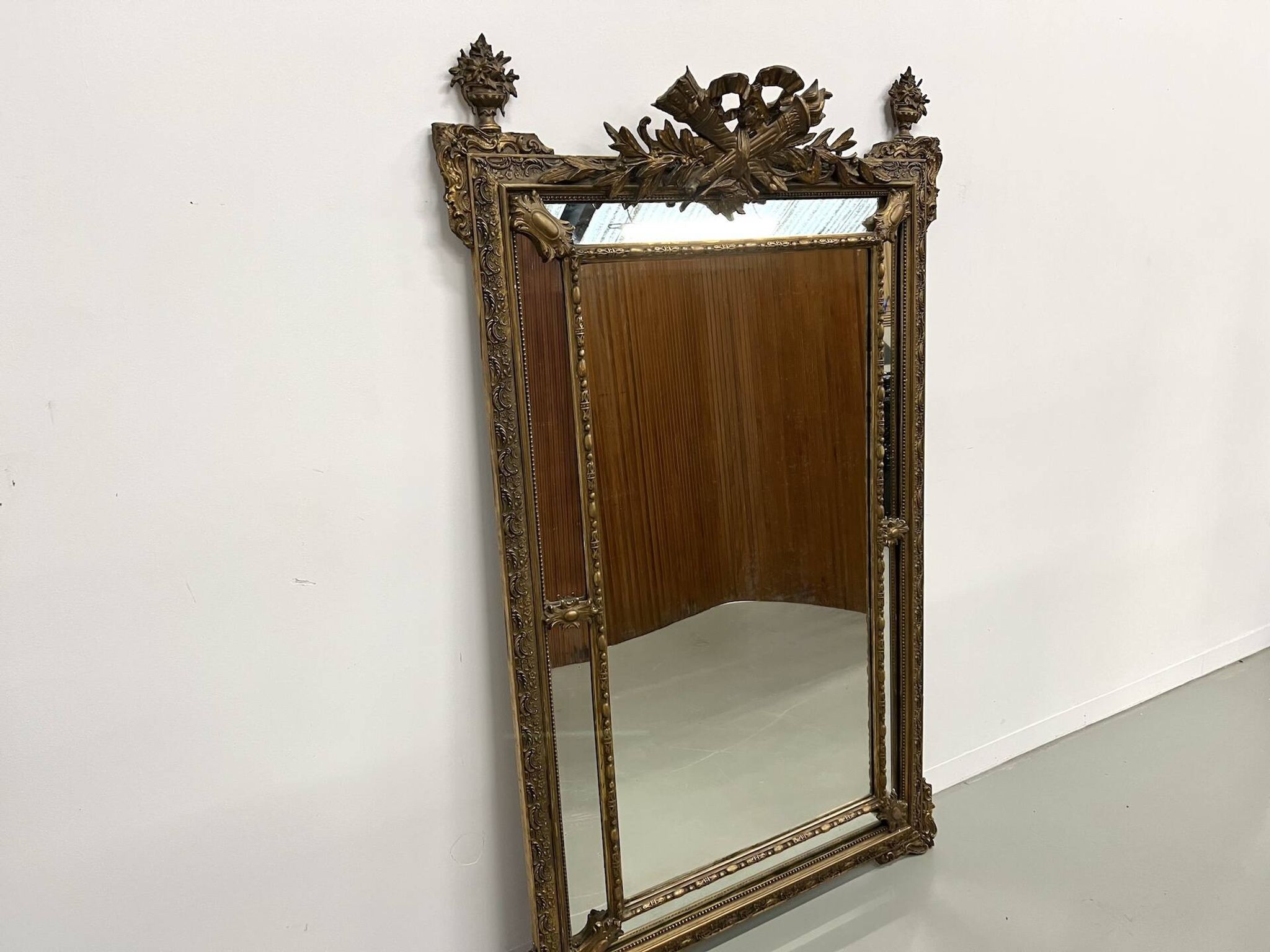 Large antique pediment mirror with mouldings.