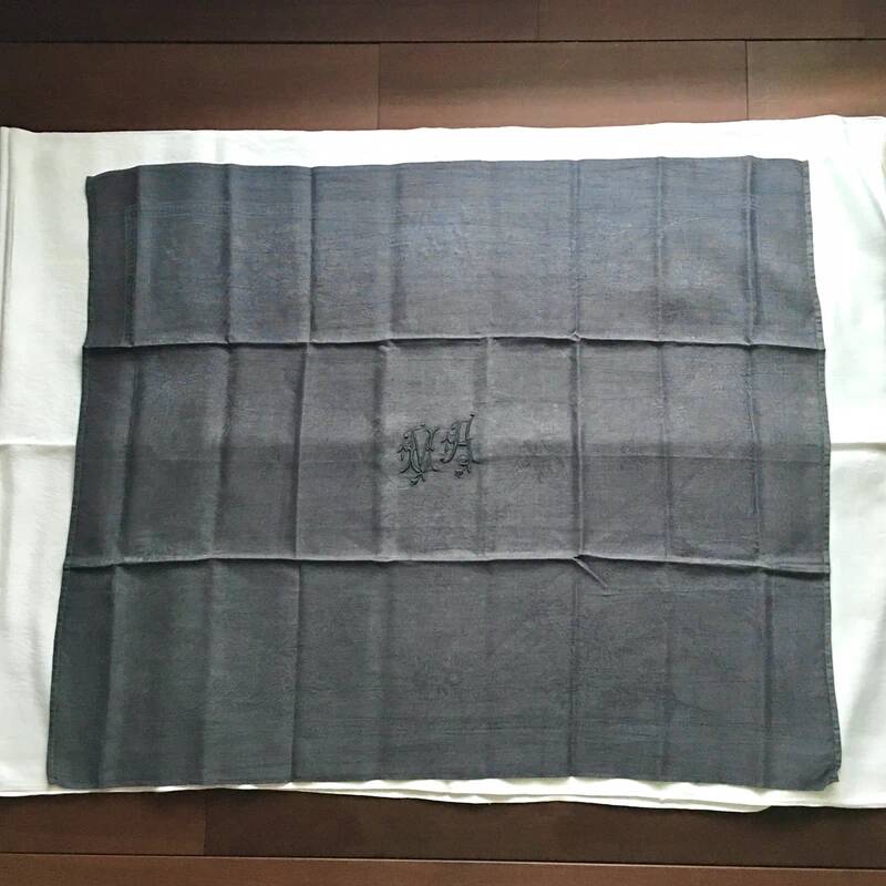 Old embroidered table napkin MA dark grey