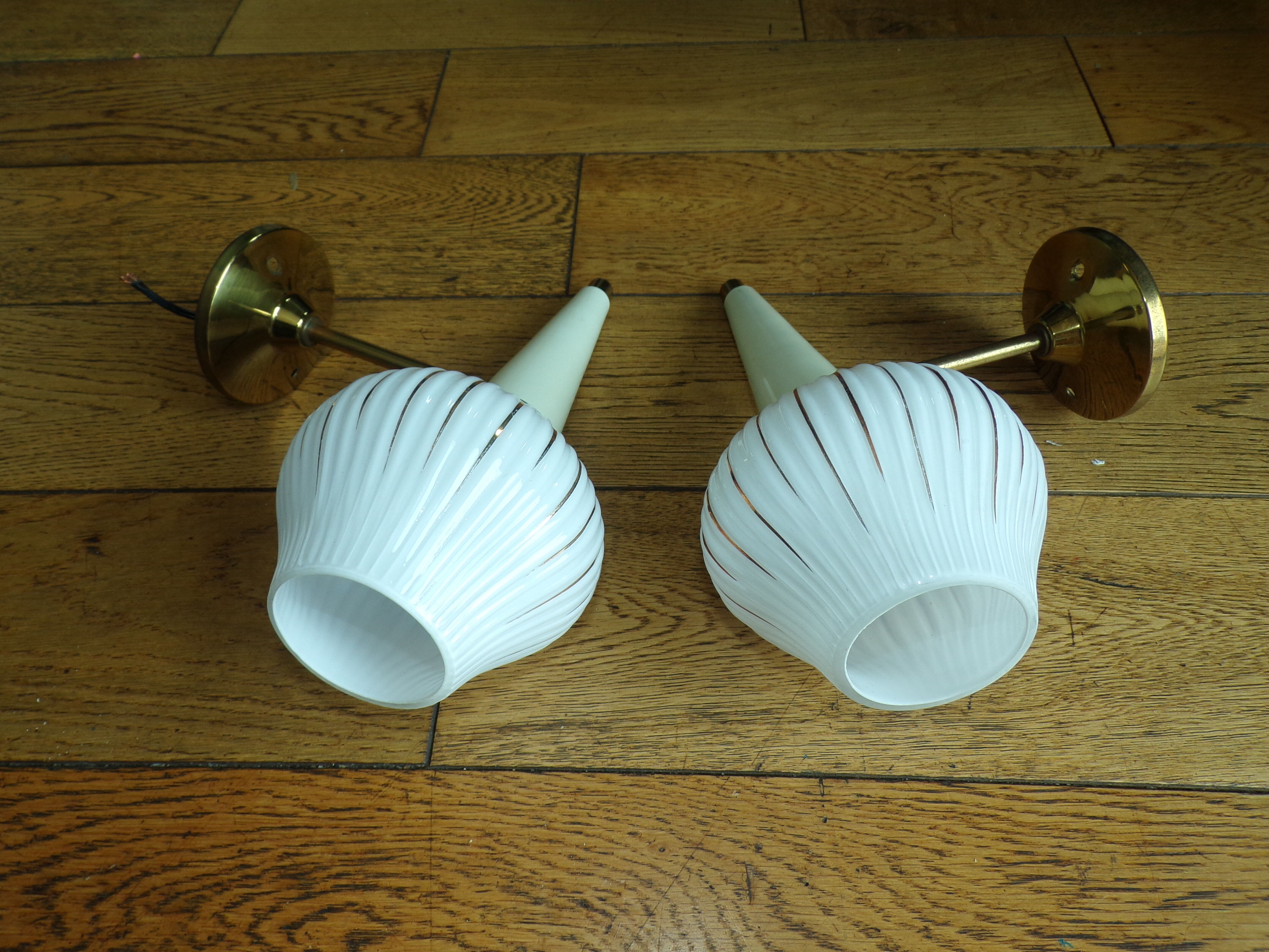 Pair of modernist torch wall light