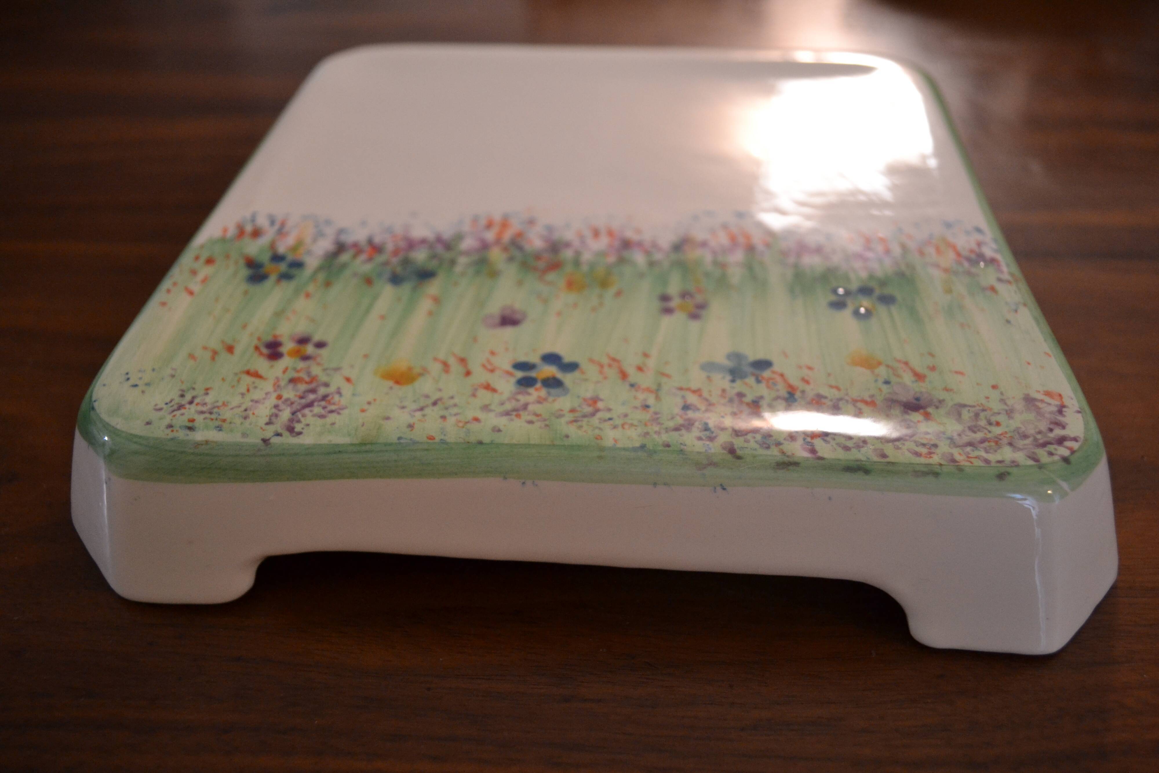 Underside of flat small flowers painted by hand