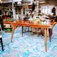 Expandable vintage table with compass feet