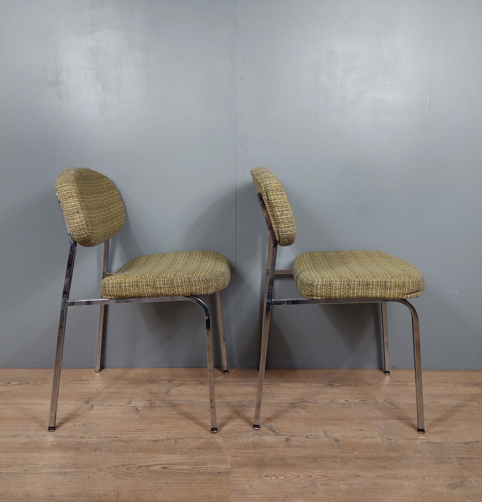 Pair of vintage chairs in fabrics and metal