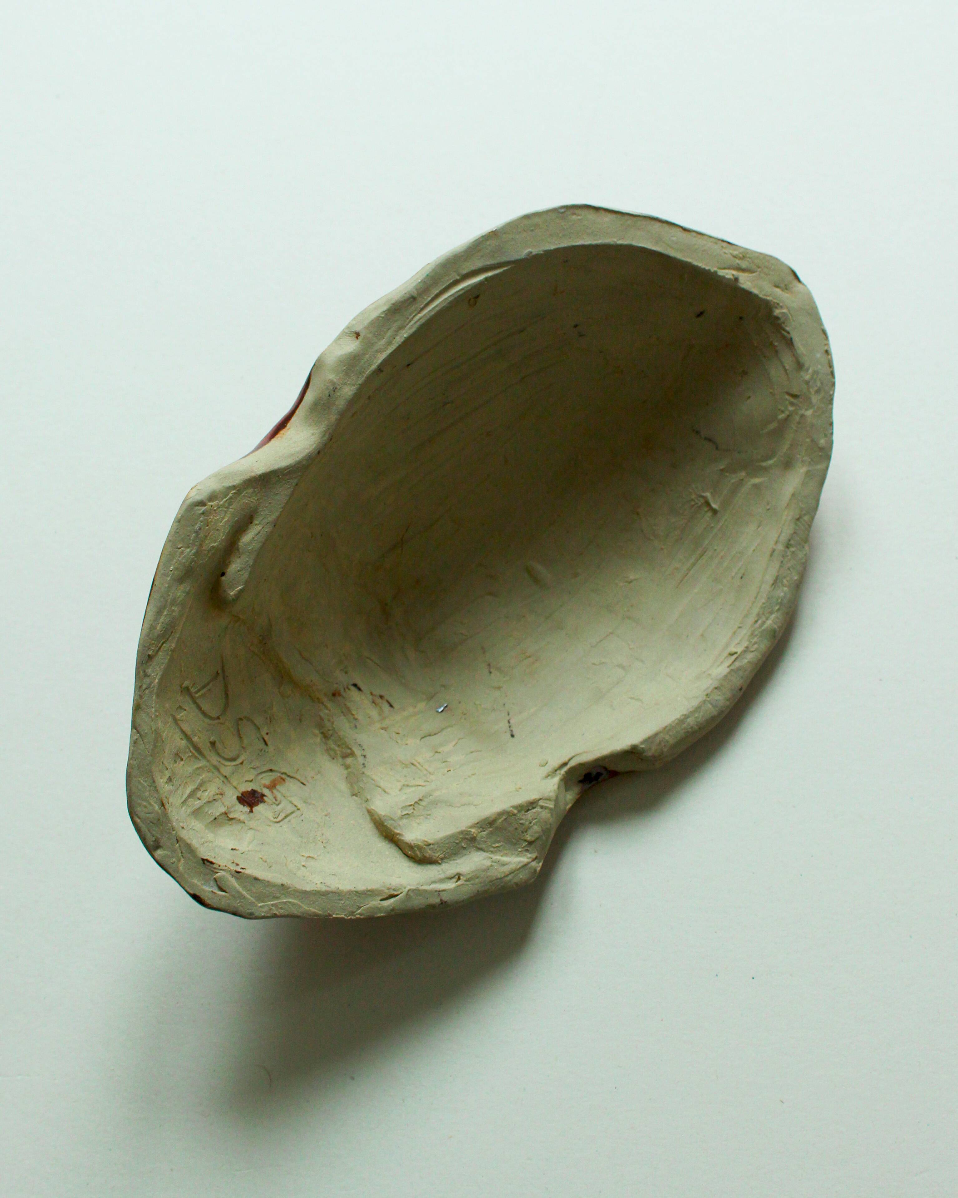 Masque en céramique émaillée rouge, dans le goût d'Accolay, années 50 / 60
