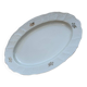 Large yellow porcelain serving dish by Bernadotte from the 1960s, with a gold rim and relief.