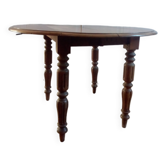 Round fruit wood table with extensions