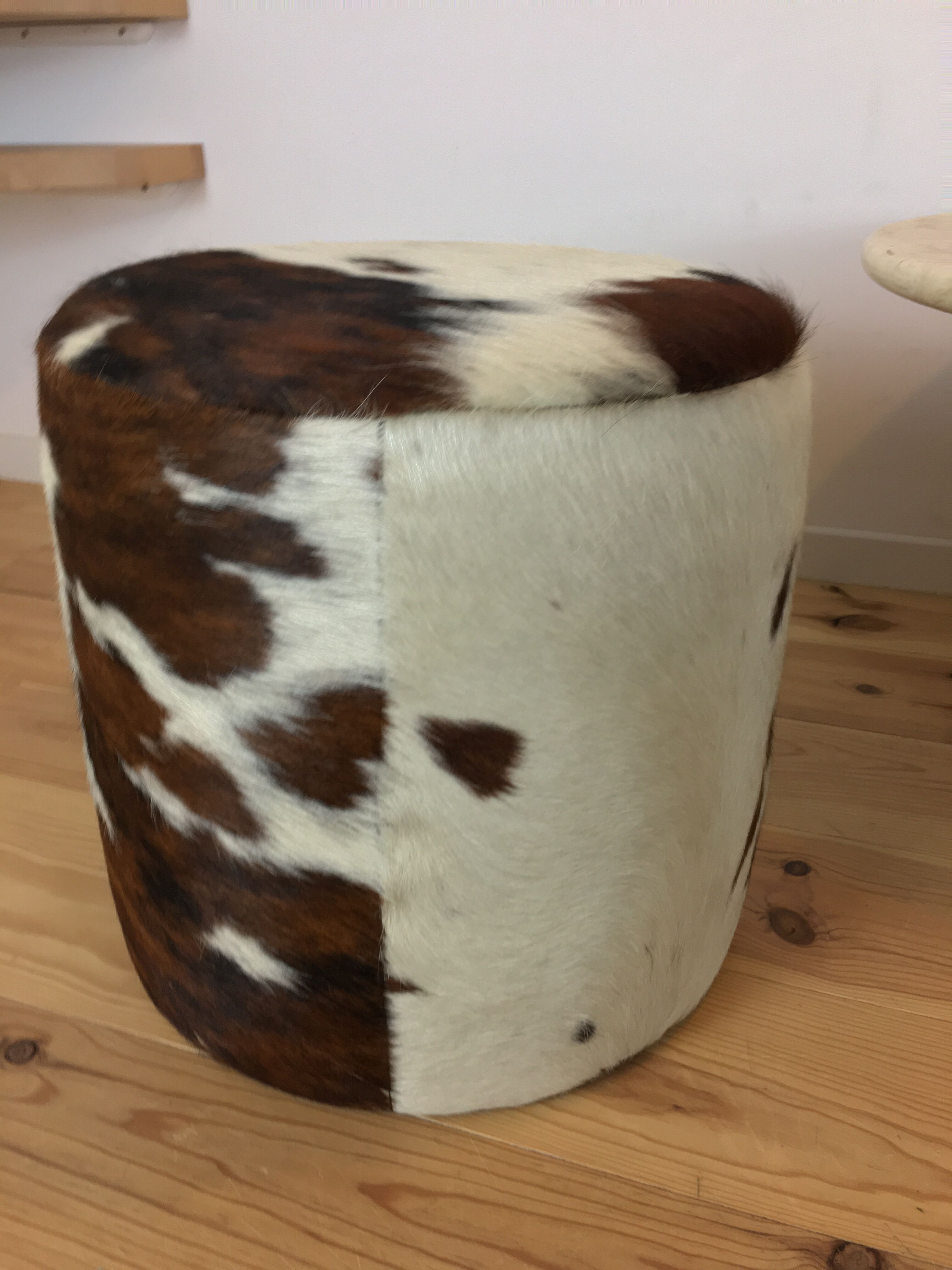 Pouf and cow cushion, leather