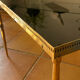 Table basse en laiton massif et plateau en verre noir