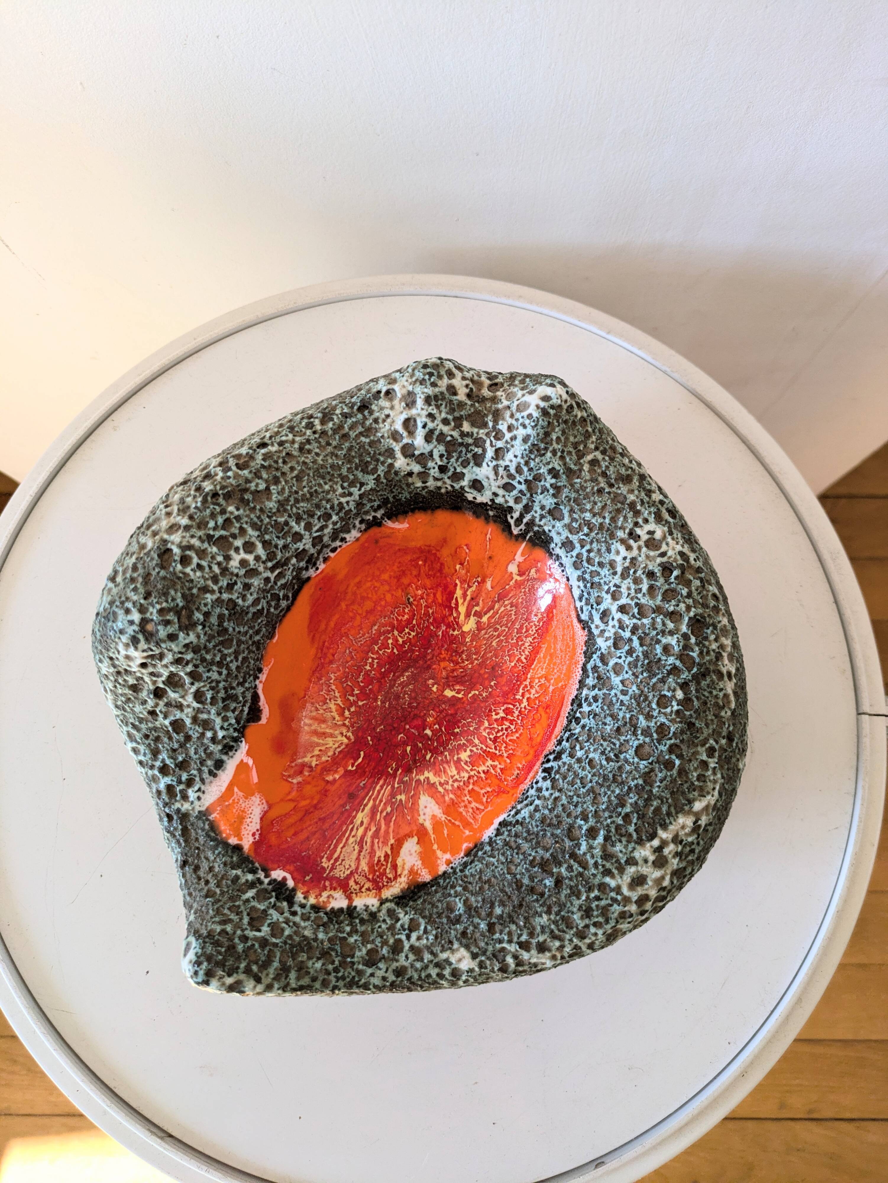 Volcanic lava pocket emptier, 70s design