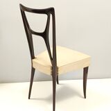 Ensemble de six chaises de salle à manger en hêtre noirci avec revêtement en skaï ivoire, Italie