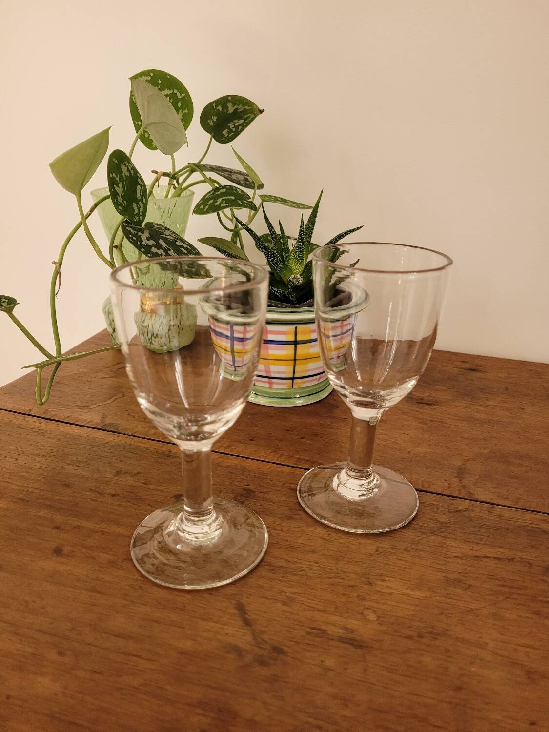 2 small stemmed glasses