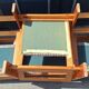 Brutalist-style bench and armchairs in 1970s pine.