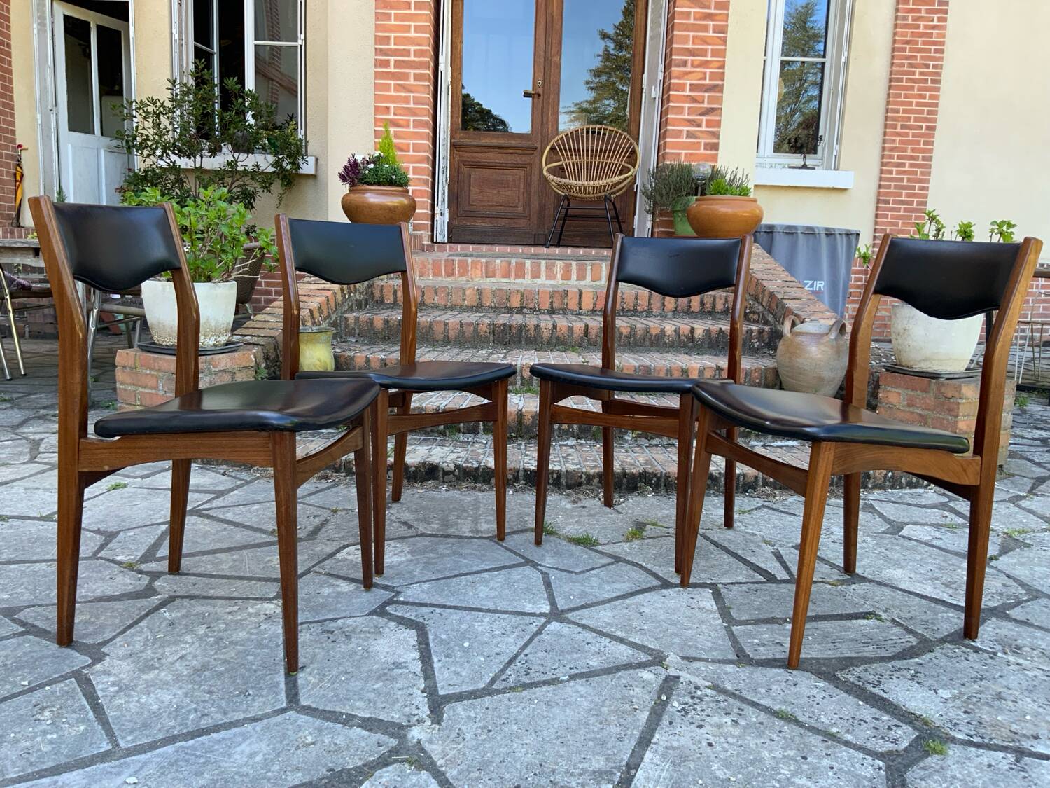 4 Scandinavian black leatherette chairs