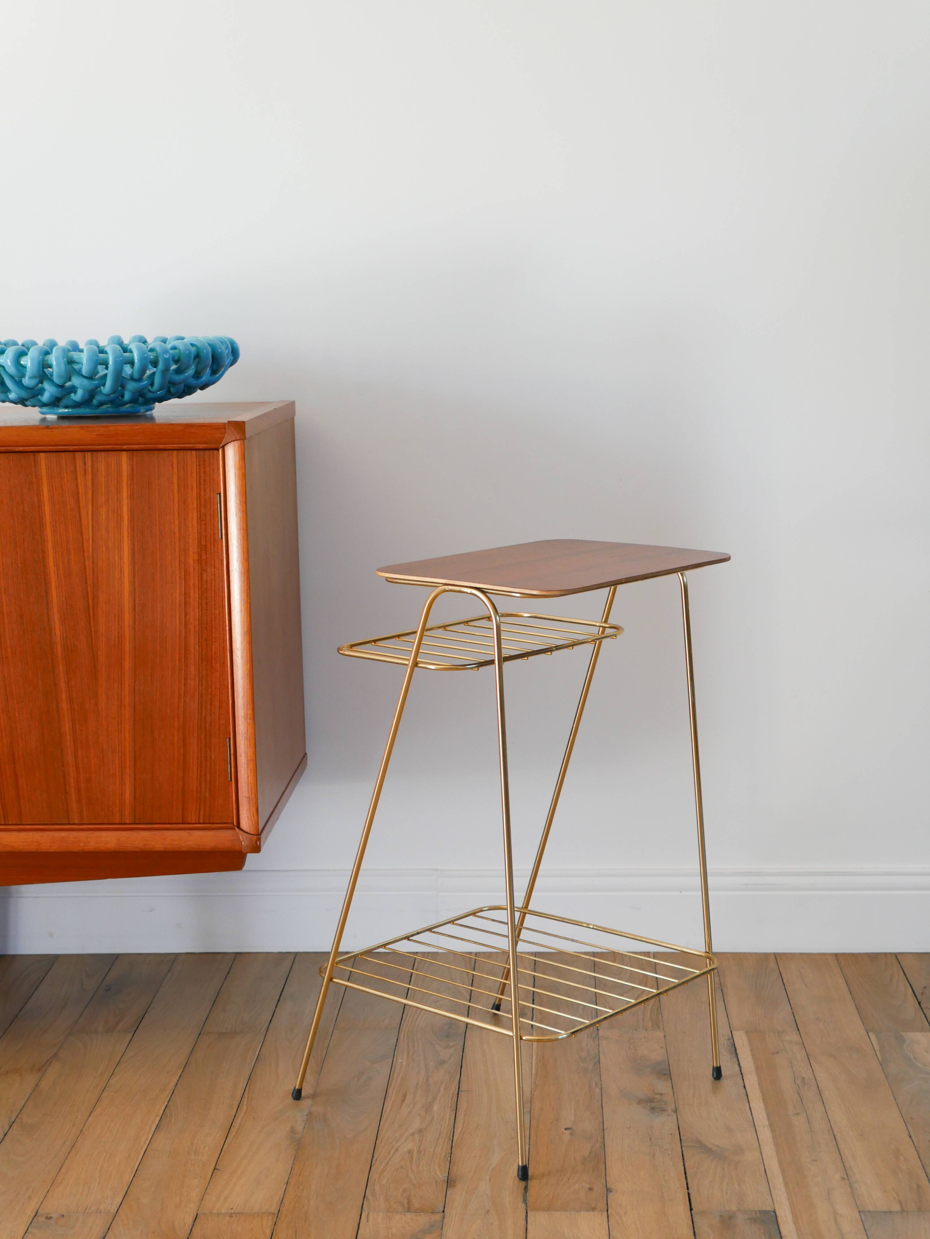 Small brass side table with a teak top, 1960.