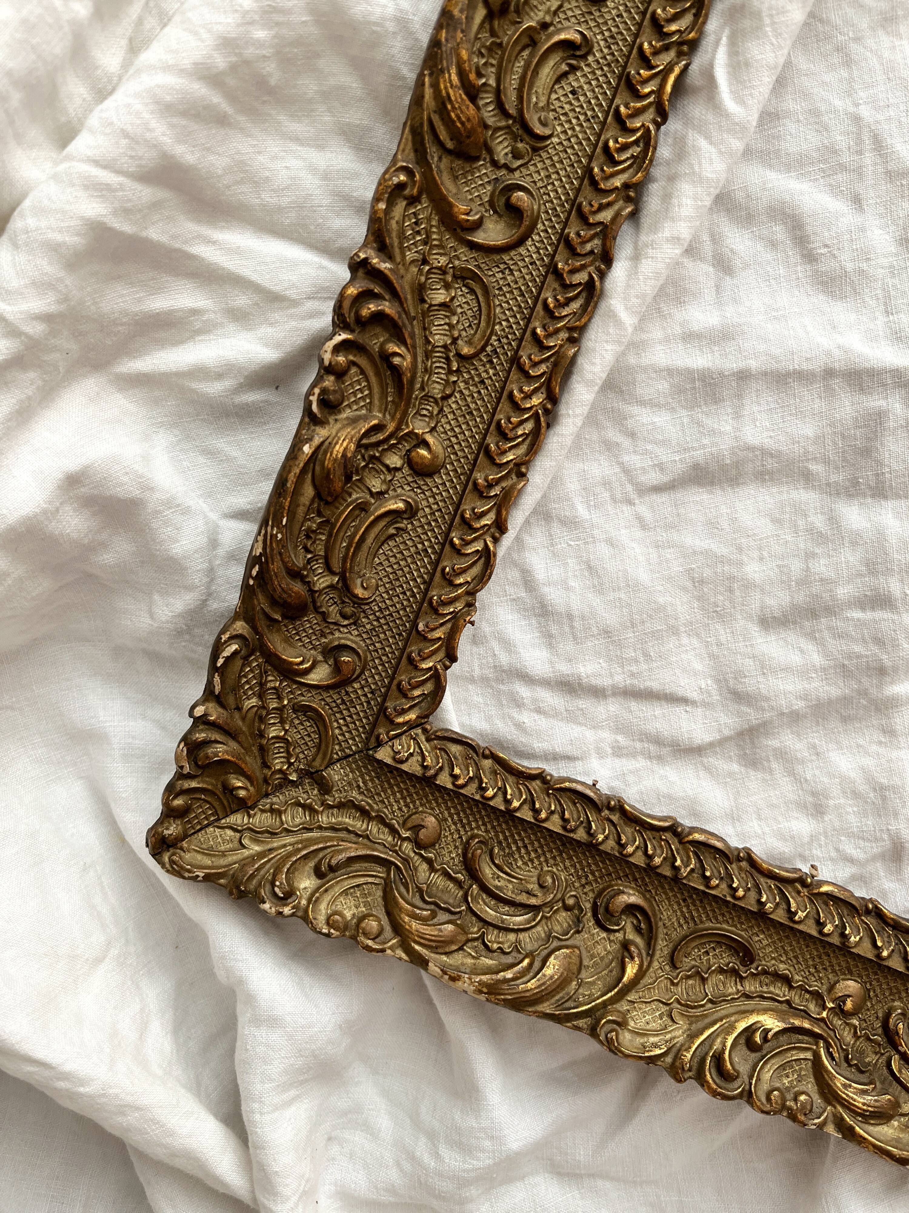 Old frame in gilded wood with stucco decoration circa 1900