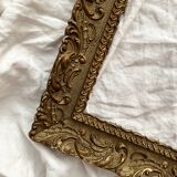Old frame in gilded wood with stucco decoration circa 1900