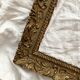 Old frame in gilded wood with stucco decoration circa 1900