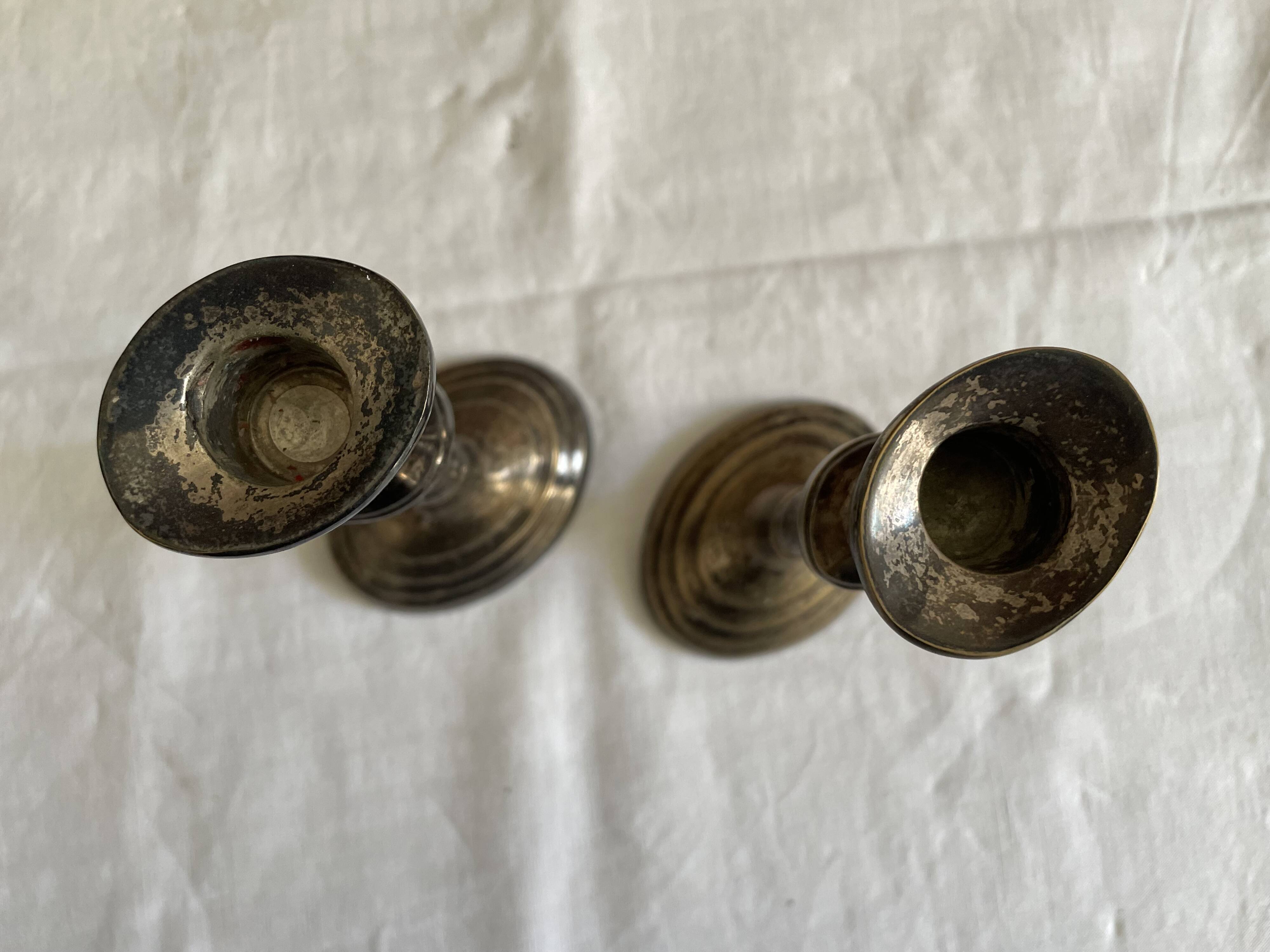 Pair candlesticks silver metal