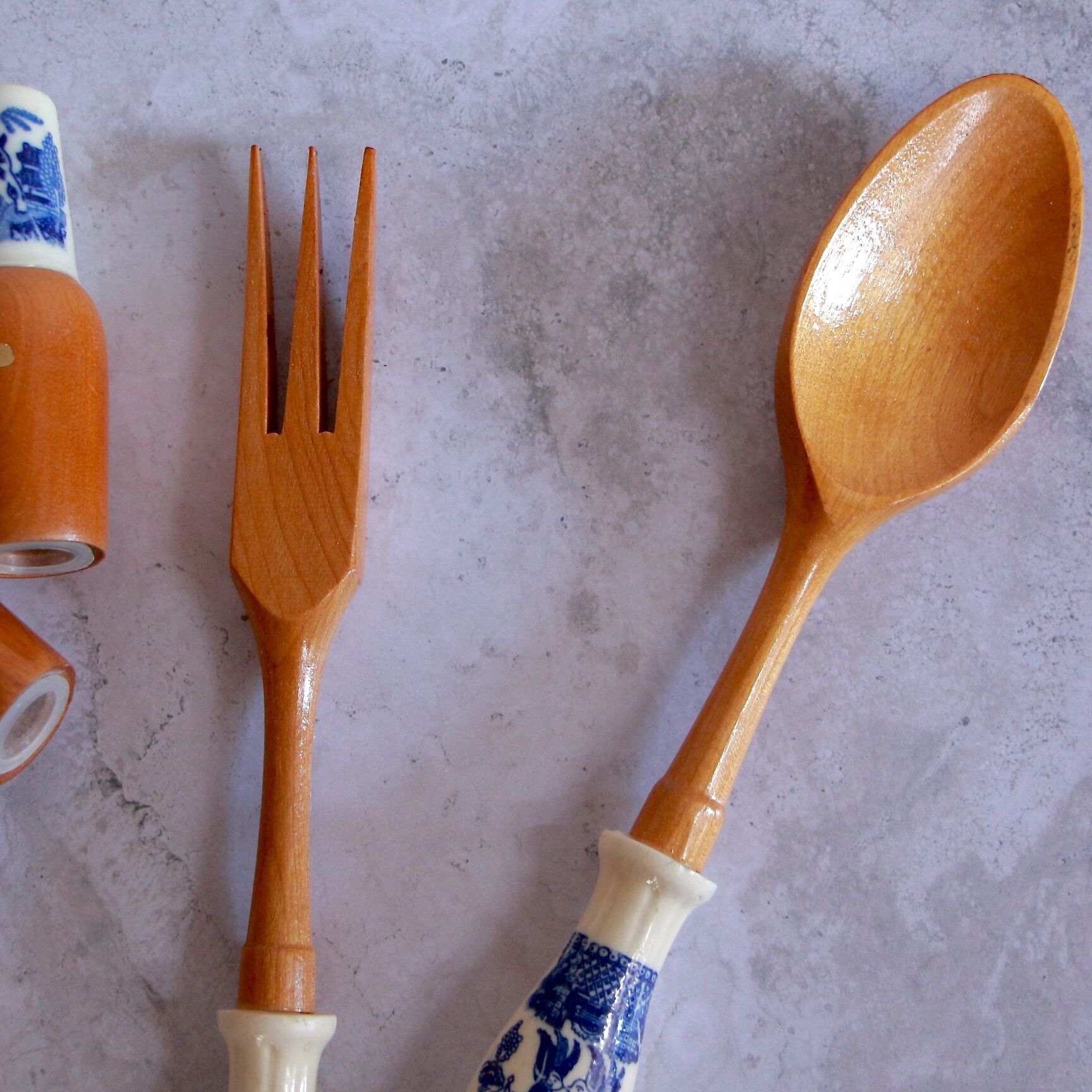 Set of wooden and ceramic salad cutlery