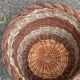 Round woven wicker basket in two colours
