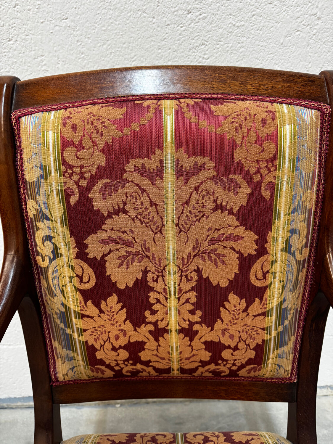 Pair of cross-back armchairs, Empire style, 19th century.