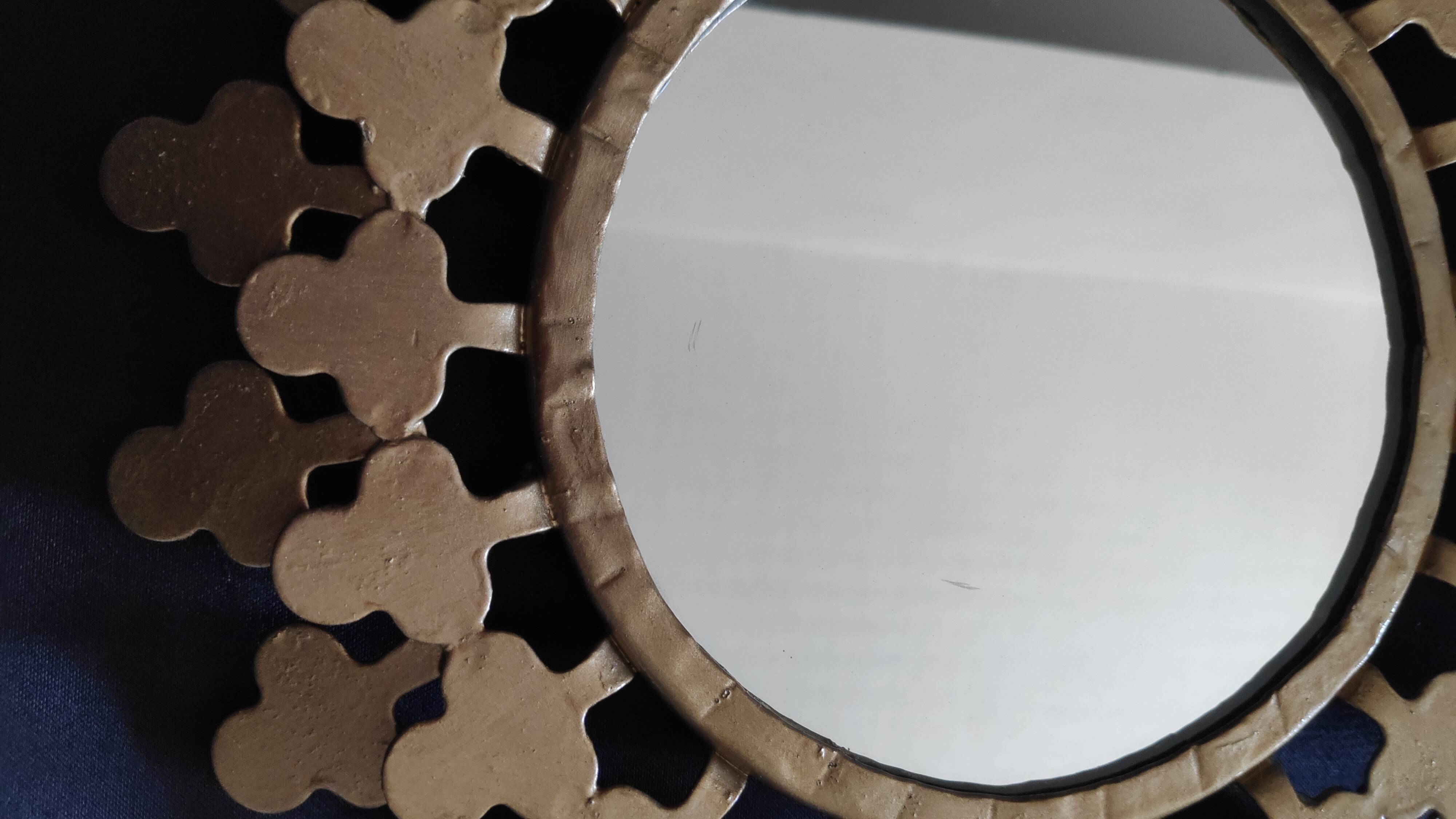 Miroir rond en métal doré