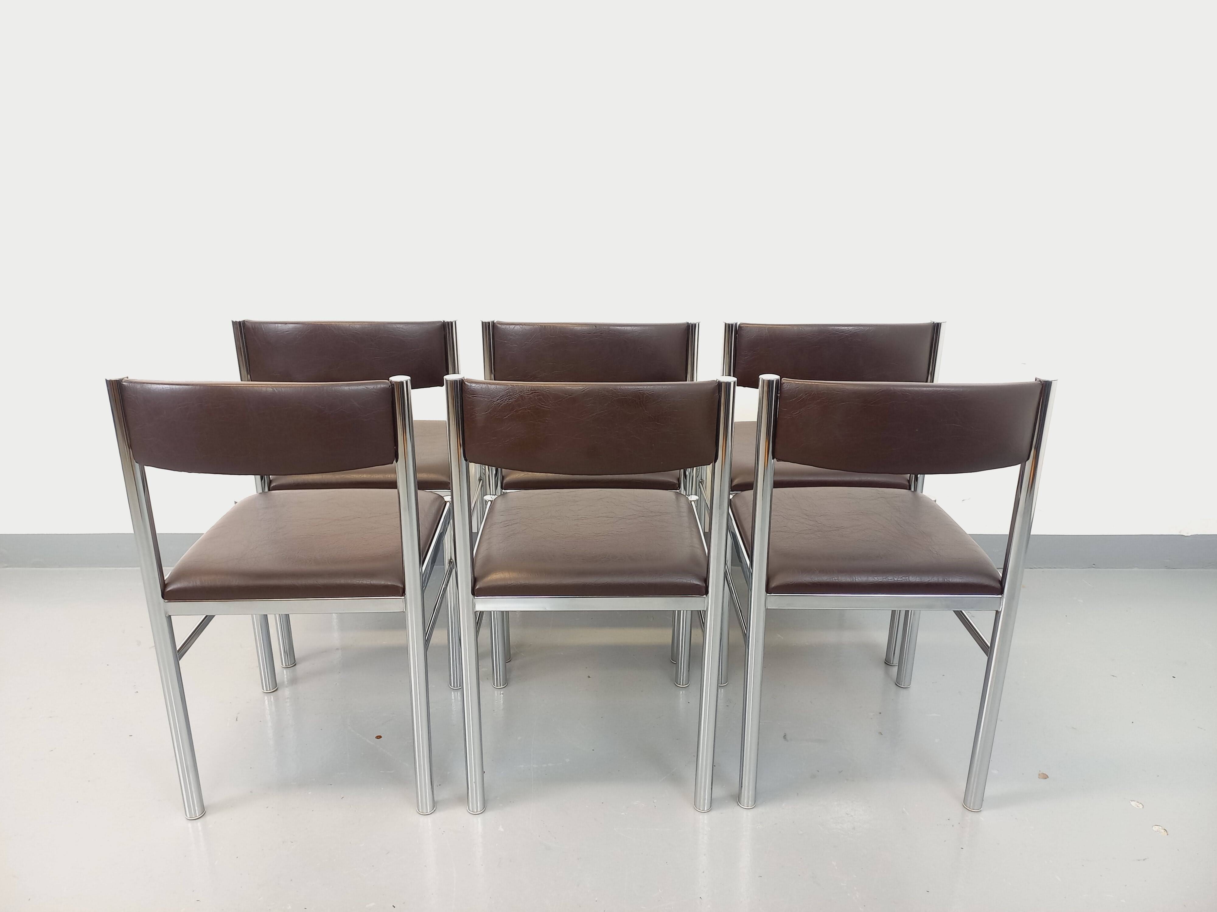 Set of 6 vintage chairs from the 70s in chrome metal and brown faux leather.