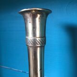 Large candlestick in chiseled brass