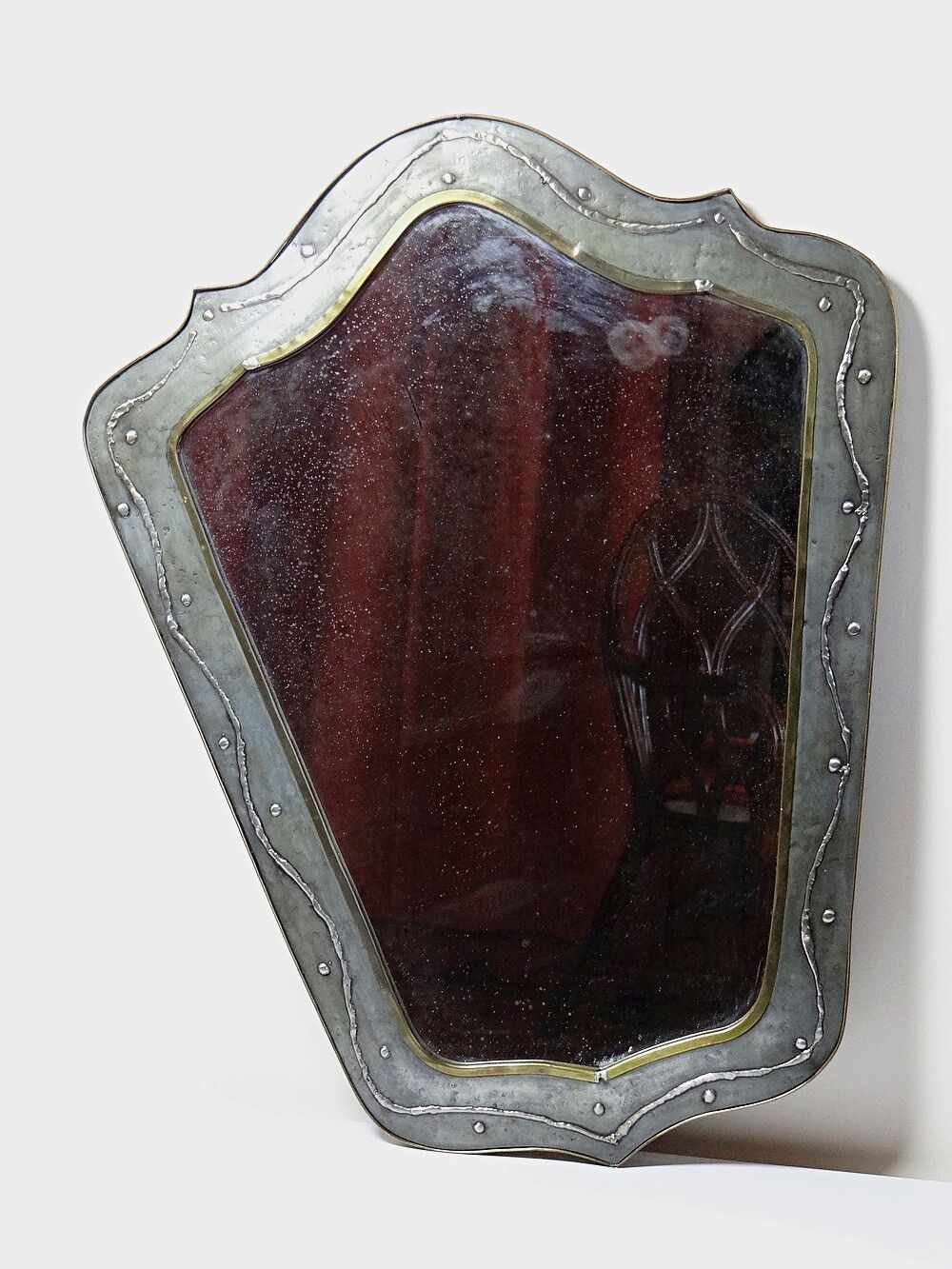 Brutalist mirror by Jean Goardère, brass and tin, 1970s.