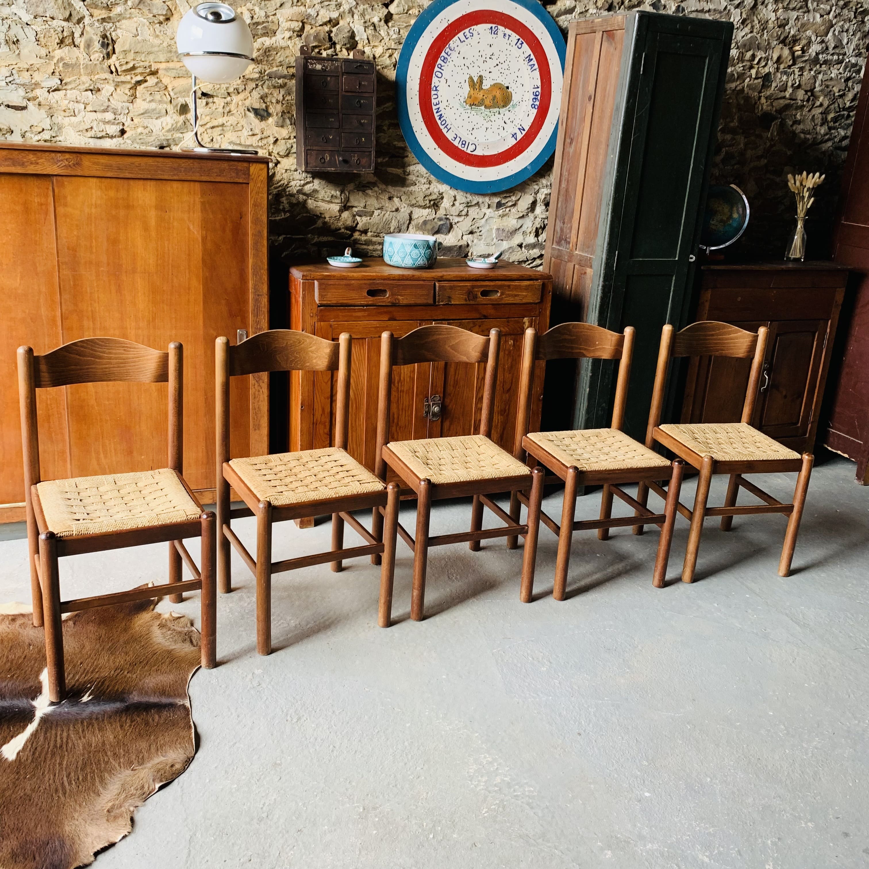 5 chairs made of wood and rope