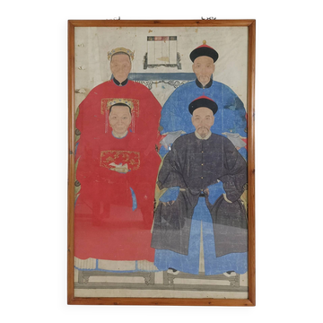 A framed Chinese ancestral portrait is a traditional hand-painted