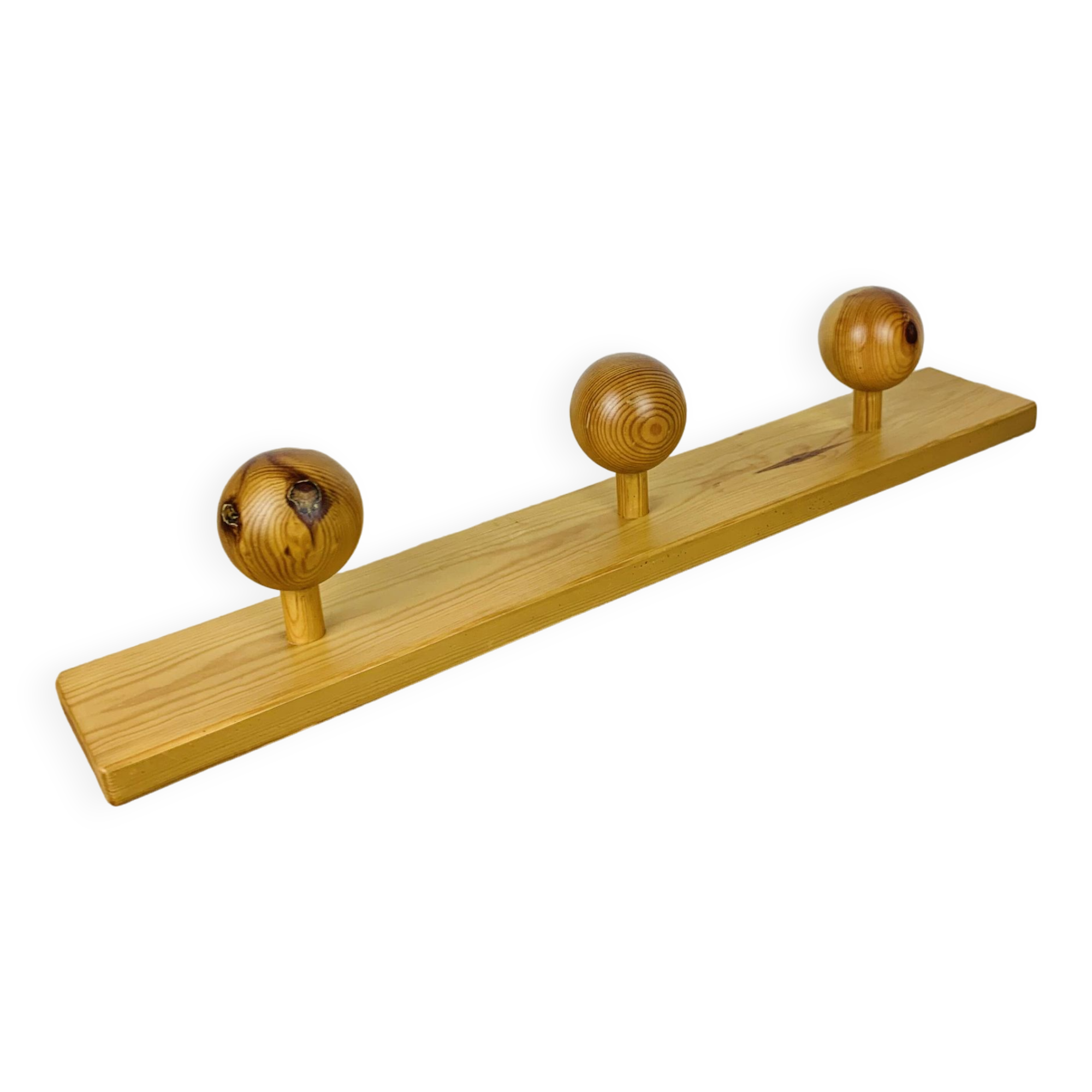 Wall coat rack with pine ball hook