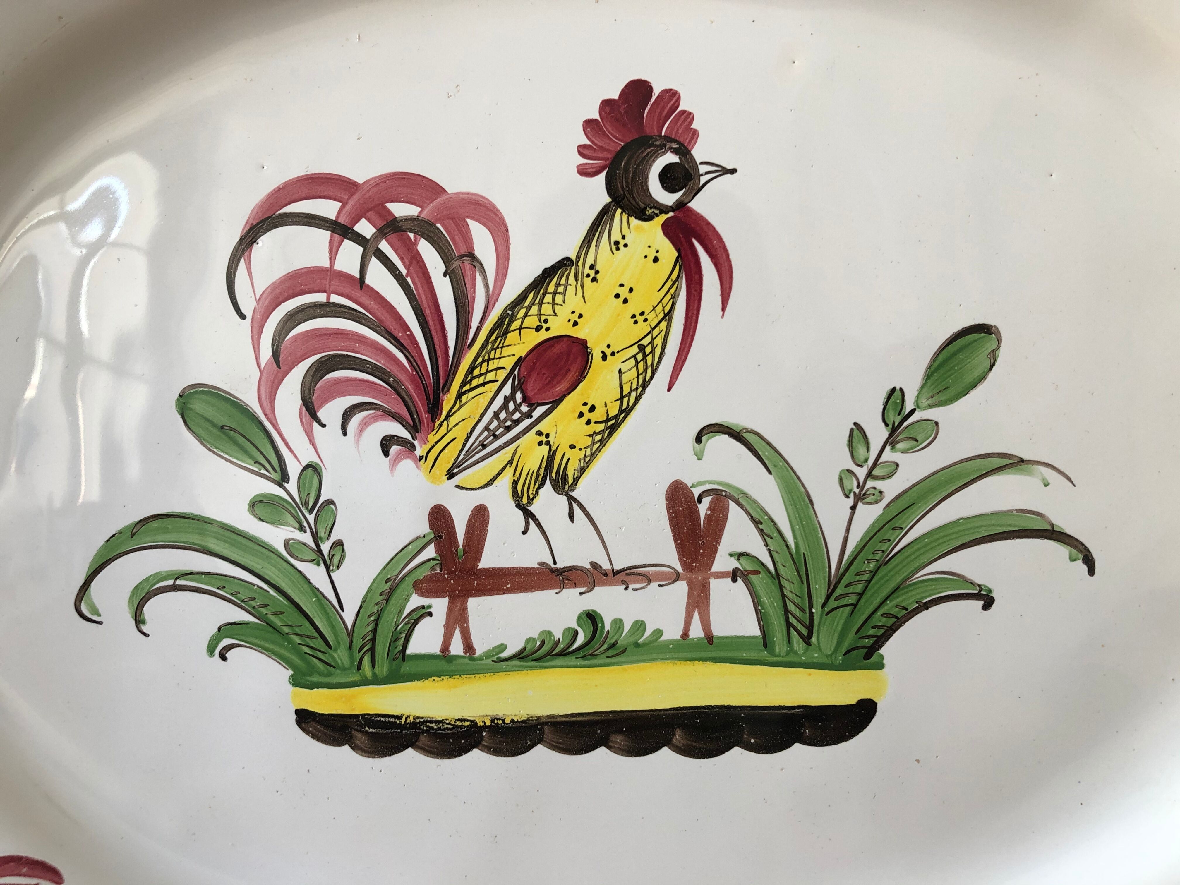 Flat oval islettes decorated with rooster 19th