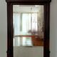 Large antique 19th-century mirror in carved wood - Haussmannian style.