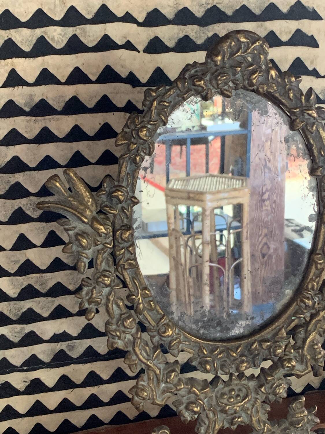 Psyche mirror in brass