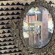 Psyche mirror in brass