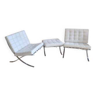 Pair of barcelona armchairs and its ottoman, by ludwig mies van der rohe circa 1980