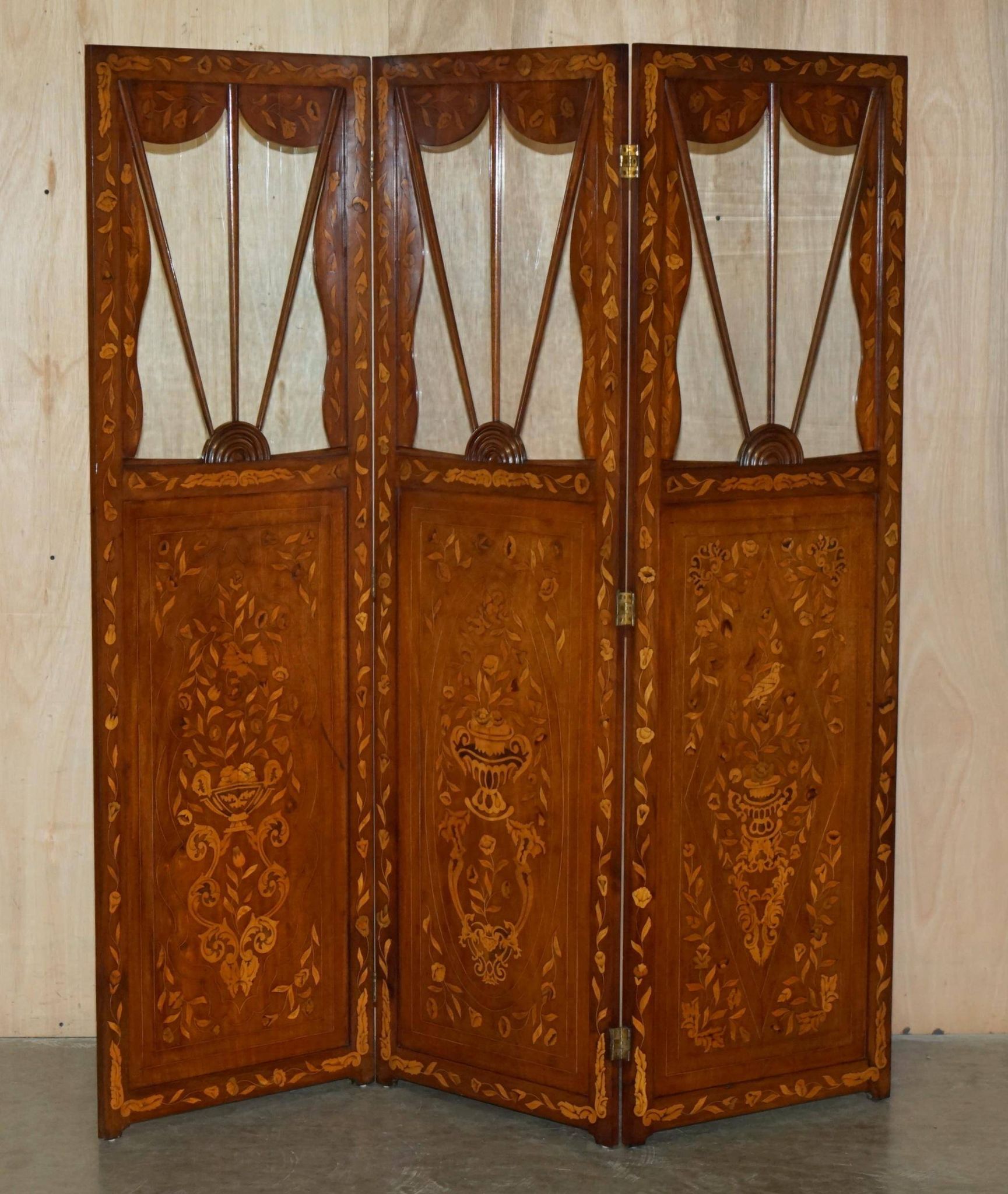 Pair of three-panel screens made of Dutch hardwood and walnut.