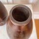 Pair of Art Deco carved wooden vases
