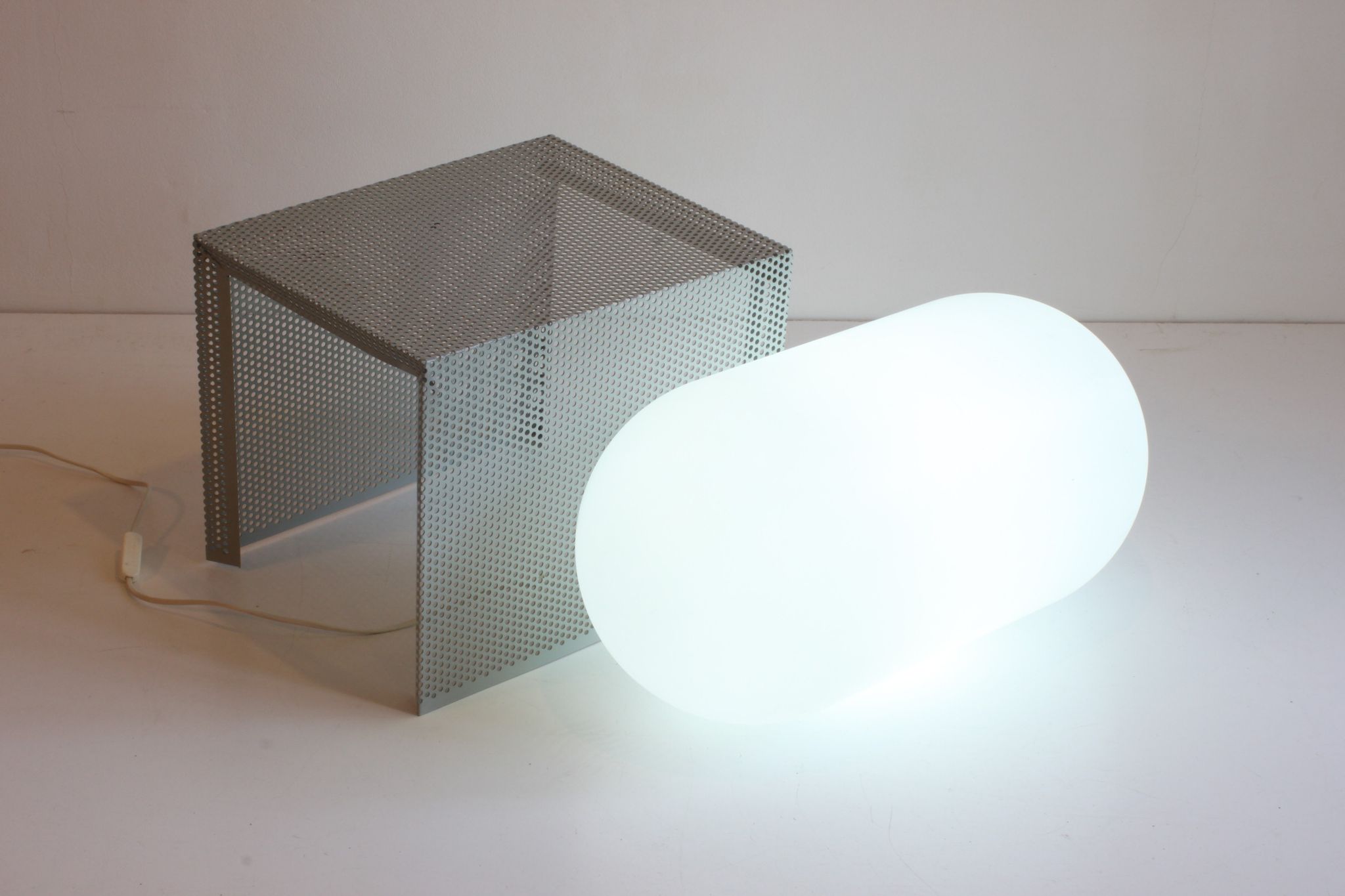 Grey perforated metal nesting side tables, 1990s set of two.