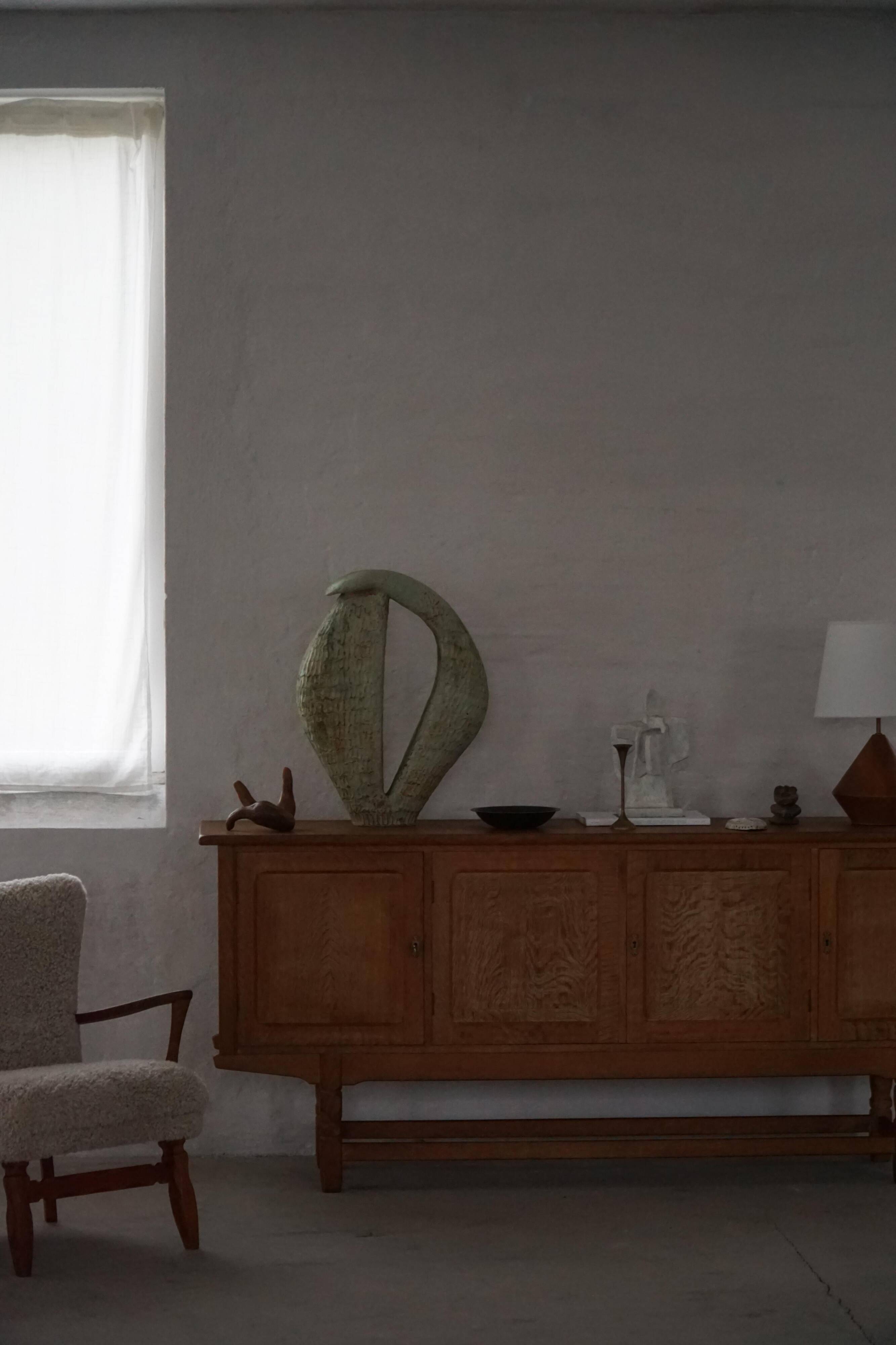 Low oak sideboard, mid-century modern, made by a Danish cabinetmaker, 1960s.