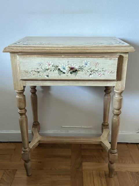 exotic wood console with a drawer