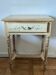 exotic wood console with a drawer
