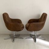 Pair of brown suede swivel office chairs