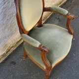 fauteuil médaillon vert