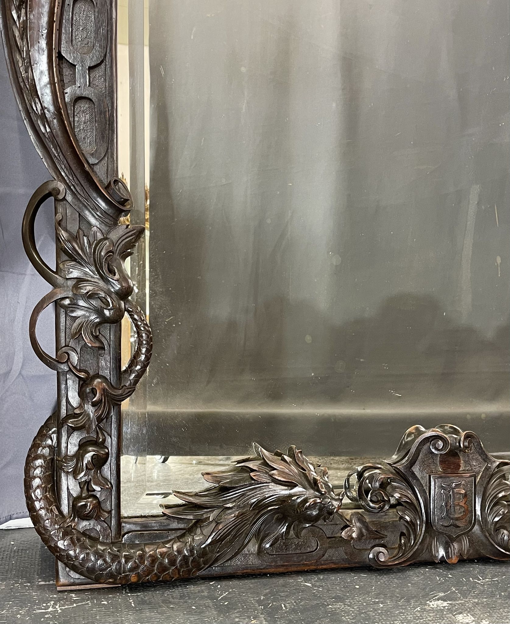 Mirror 191x122 cm period XIXth in natural wood, decoration of chimeras, satyrs