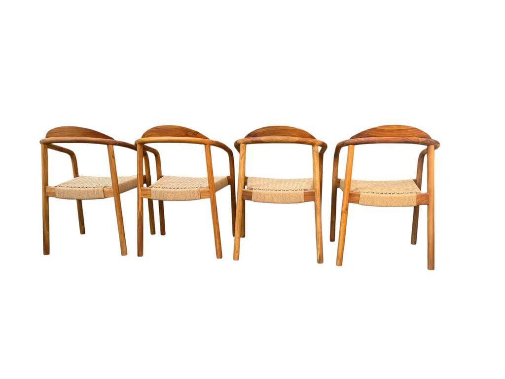 Set of 4 solid wood chairs with cord and armrests.