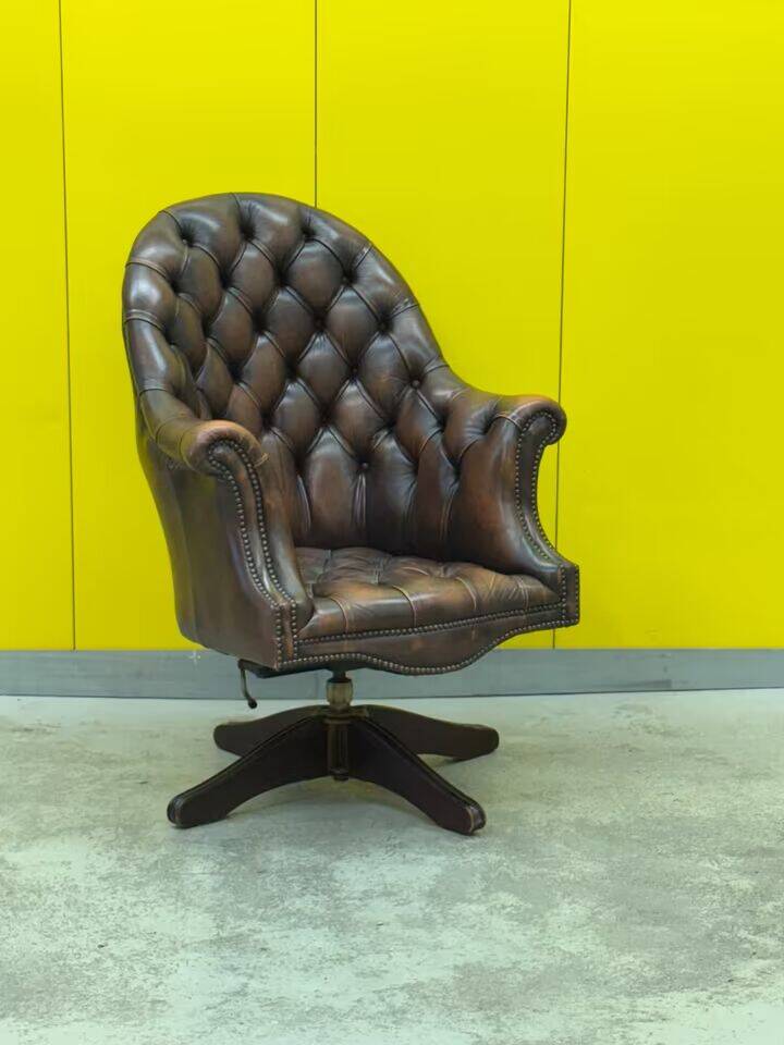 Brown leather chesterfield directors armchair