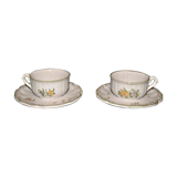Two MOUSTIER cups decorated with flowers signed